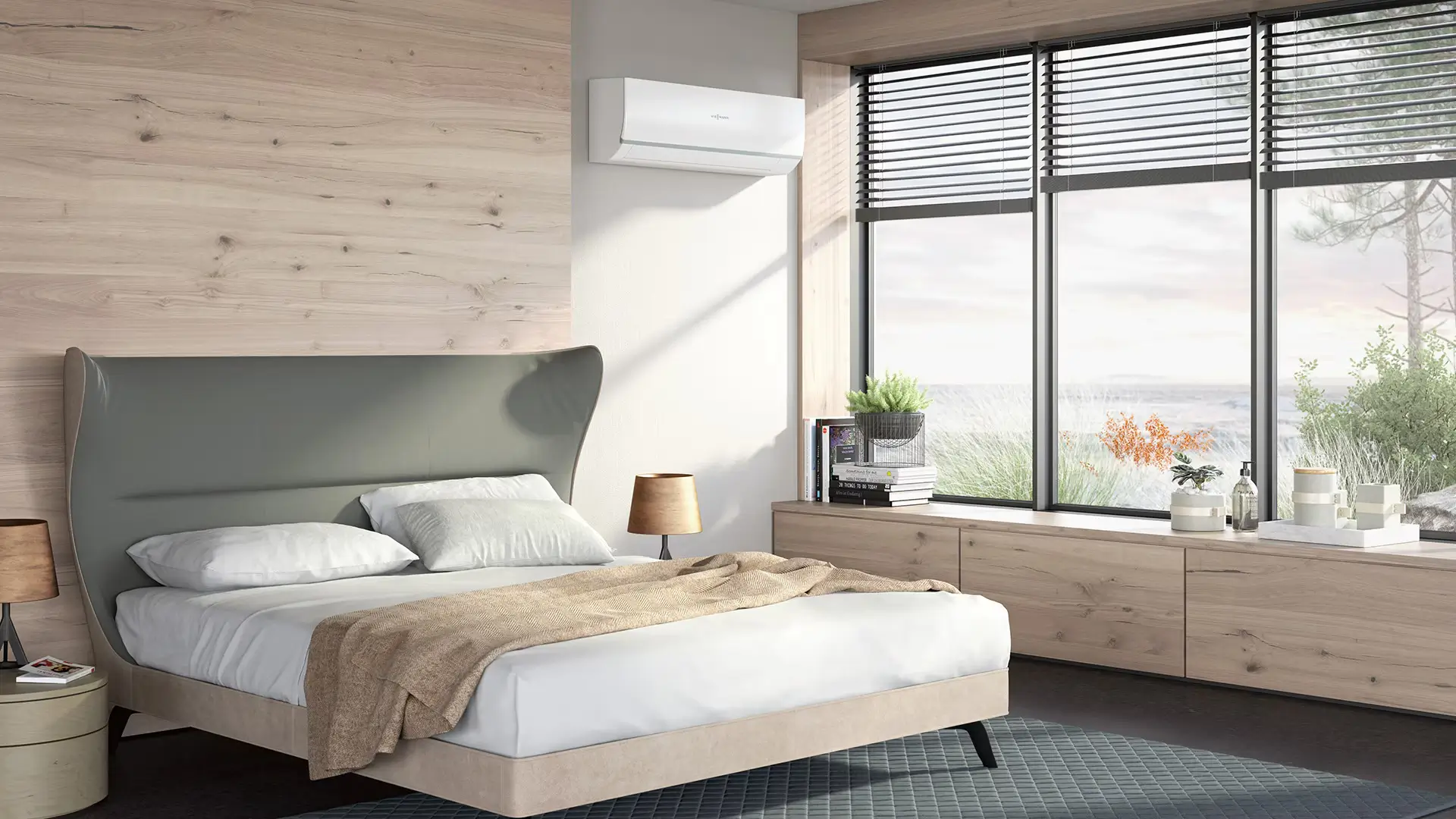 Modernes Schlafzimmer mit großer Fensterfront und wandmontierter Klimaanlage, die für ein angenehmes Raumklima und hohen Wohnkomfort sorgt.
